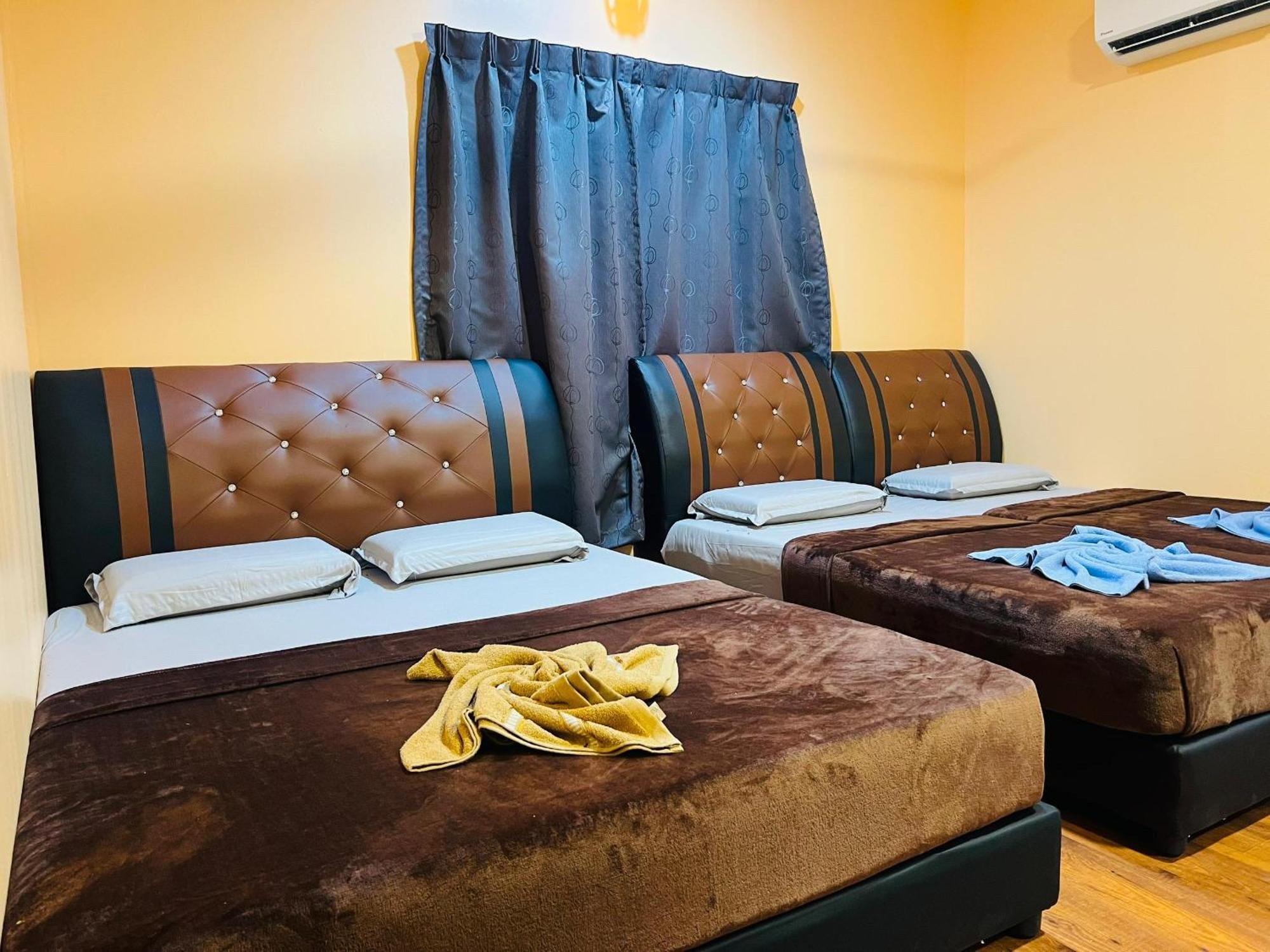Sukau Backpackers Bed & Breakfast ภายนอก รูปภาพ
